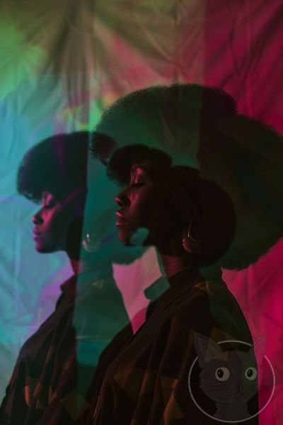 lallen_three_women_some_of_whom_look_like_they_have_afros_stand_201e4c62-14d6-481c-8487-2bf778a629db