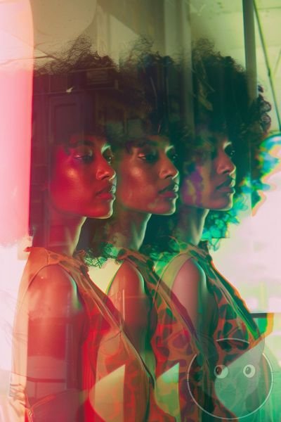 lallen_three_women_some_of_whom_look_like_they_have_afros_stand_4ed3c739-cd8a-47b4-bea2-7fdb8d0efc1d