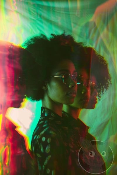 lallen_three_women_some_of_whom_look_like_they_have_afros_stand_b66d849c-ba47-4143-b0fd-e21736e786ca